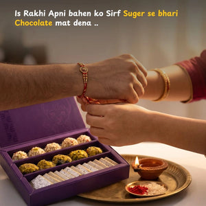 Celebrating Raksha Bandhan by tying a rakhi and gifting a healthy dry fruit sweet box.